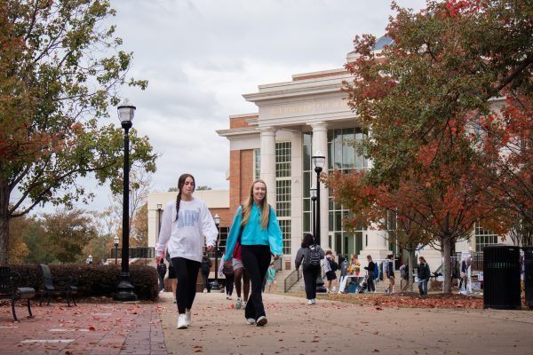 Students walk by the Student Center.