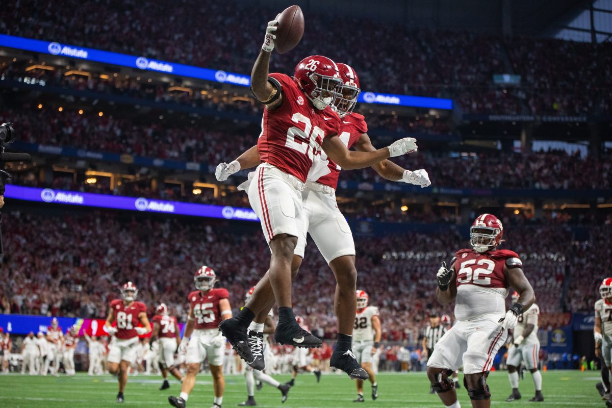 Alabama running back Jam Miller (#26) celebrates after scoring a touchdown during the SEC Championship game against Georgia.