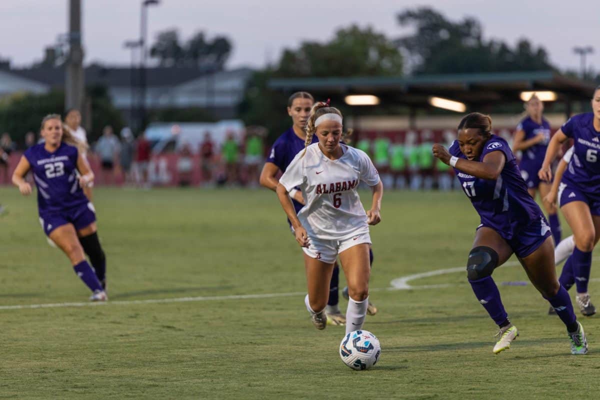 Alabama forward/midfielder Kiley Kukan dribbles towards the goal against North Alabama.