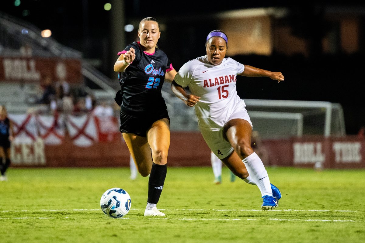 Forward Kennedy Garcia tries to steal the ball in game against Florida Atlantic University on Aug. 30