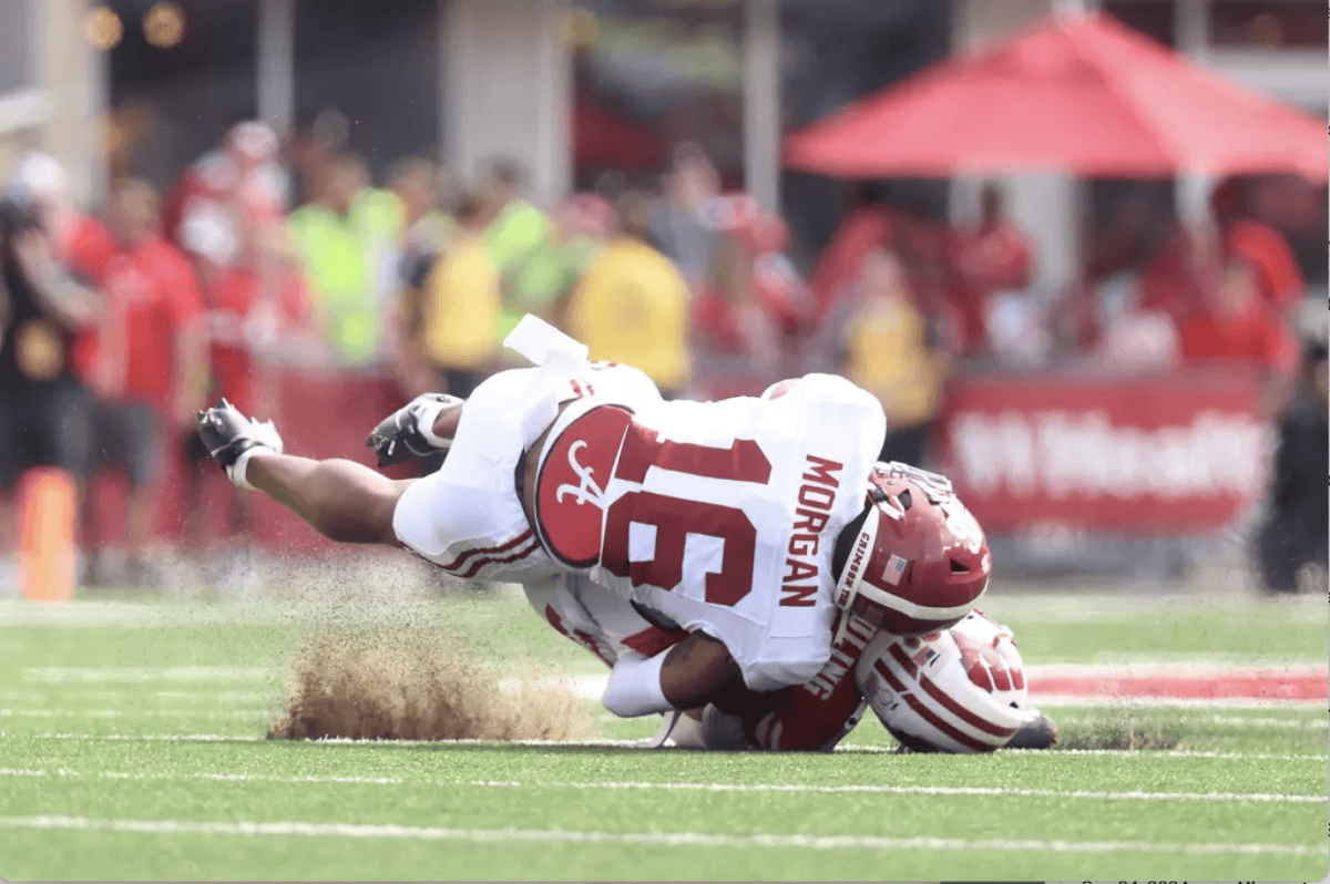 Alabama Defensive Back Red Morgan (16) makes a takle against Wisconsin at Camp Randall Stadium in Madison, Wisconsin on Saturday, Sep 14, 2024. 