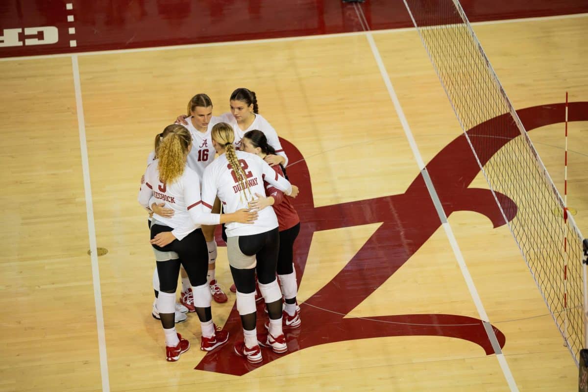 Alabama volleyball huddles in between plays against Grambling State on Aug. 30, 2024.