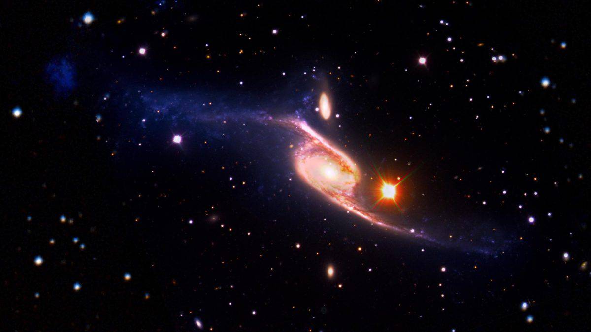 This composite of the giant barred spiral galaxy NGC 6872 is 522,000 light-years across, making it about five times the size of the Milky Way.