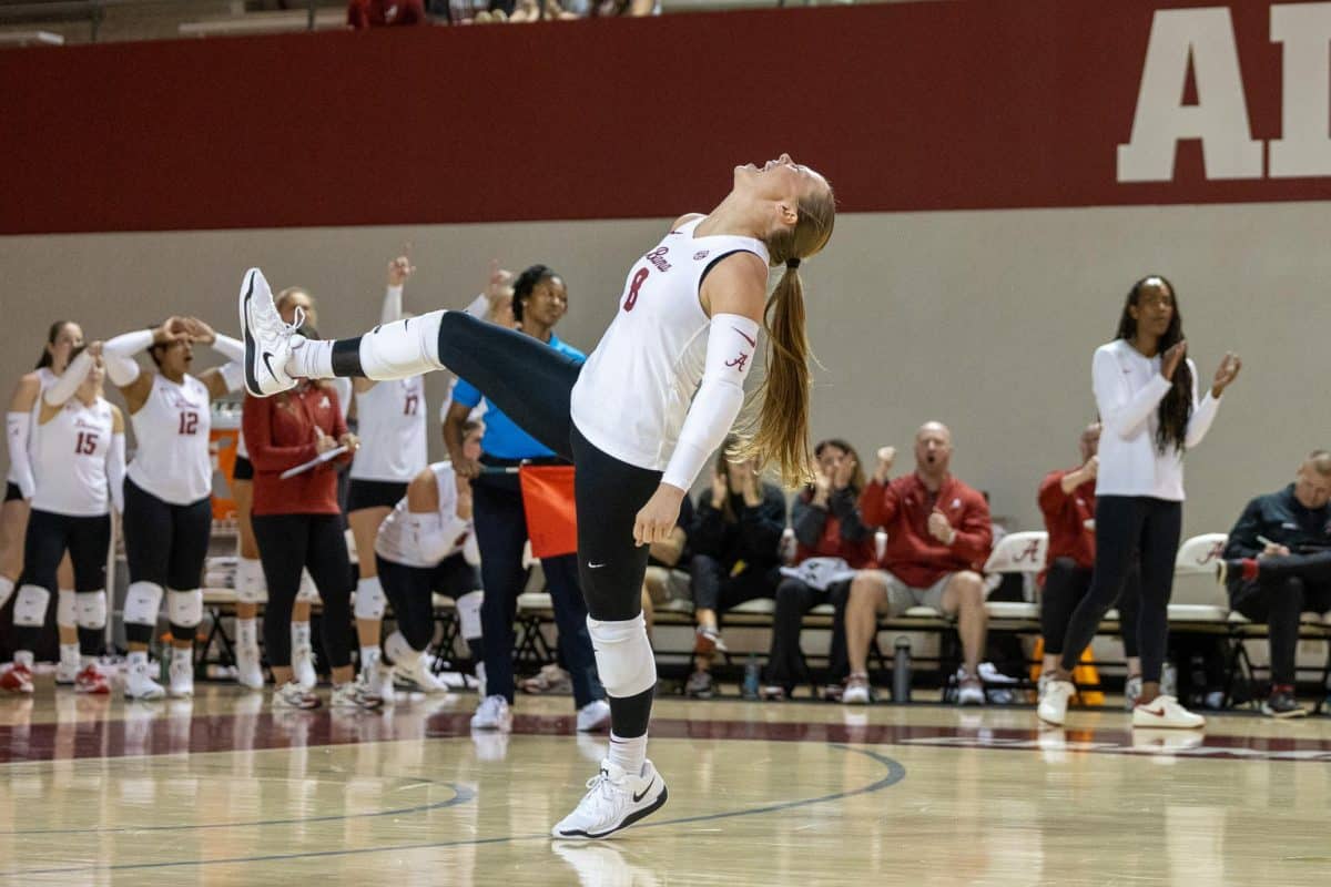 Alabama defensive specialist Lindsey Brown (#8) celebrates after play in game against the Citadel Aug. 30.