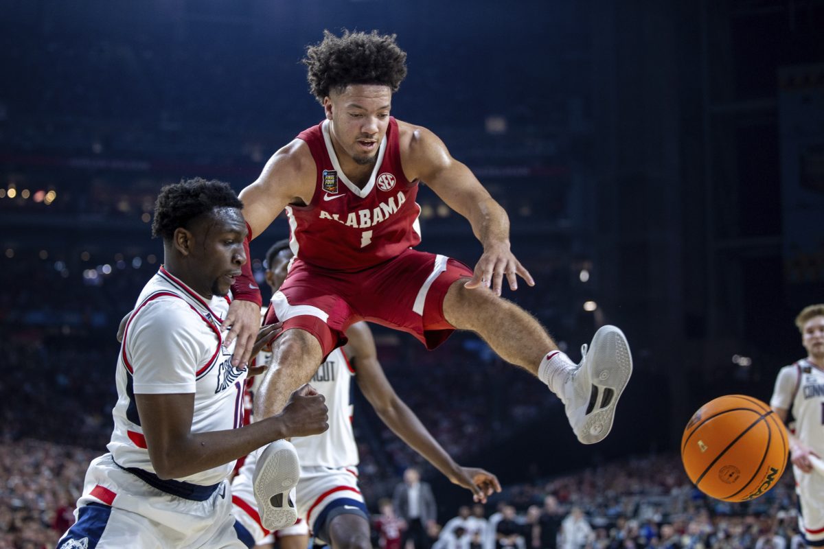 Riley Thompson // CW: Alabama guard Mark Sears fights for an inbound versus UConn in last year's Final Four game.