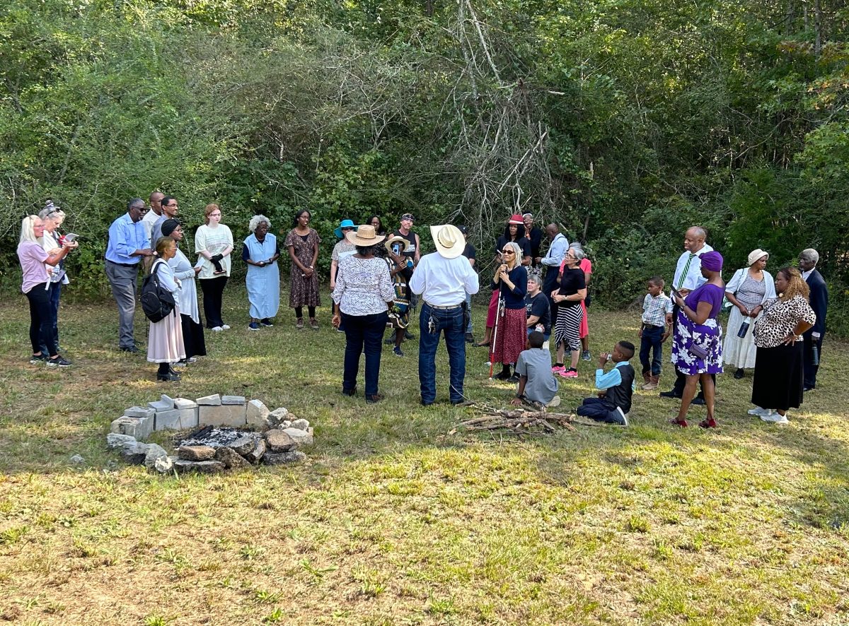 People stand around a campfire to prepare for the biblical rapture. 