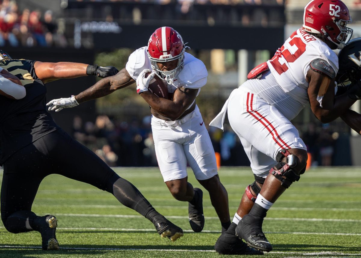 Alabama running back Jam Miller (#26) runs down the field against Vanderbilt.