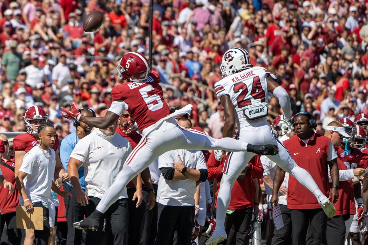 Alabama wide receiver Germie Bernard (#5) jumps up to make a catch against South Carolina.