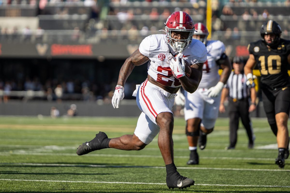 Alabama running back Jam Miller (#26) runs down the field against Vanderbilt. 