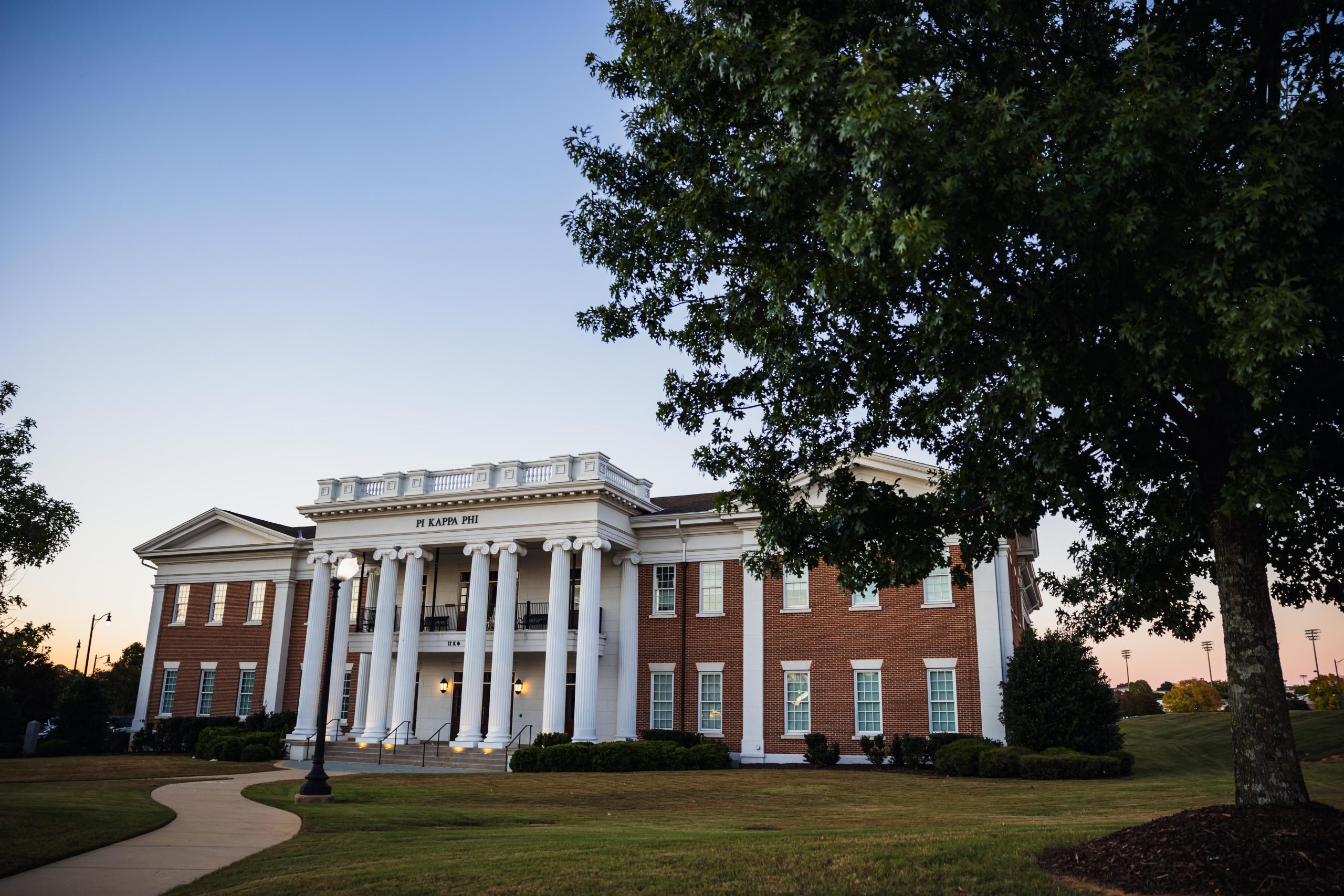 Four members of the Pi Kappa Phi fraternity were arrested for hazing.