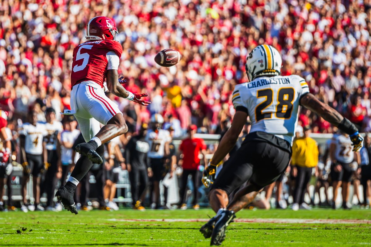 Alabama wide receiver Germie Bernard (#5) jumps to catch the ball against Missouri.