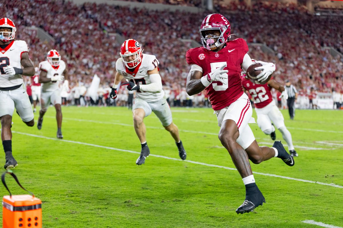 Alabama wide receiver Germie Bernard (#5) runs to score a touchdown against Georgia on Sept. 28, 2024.