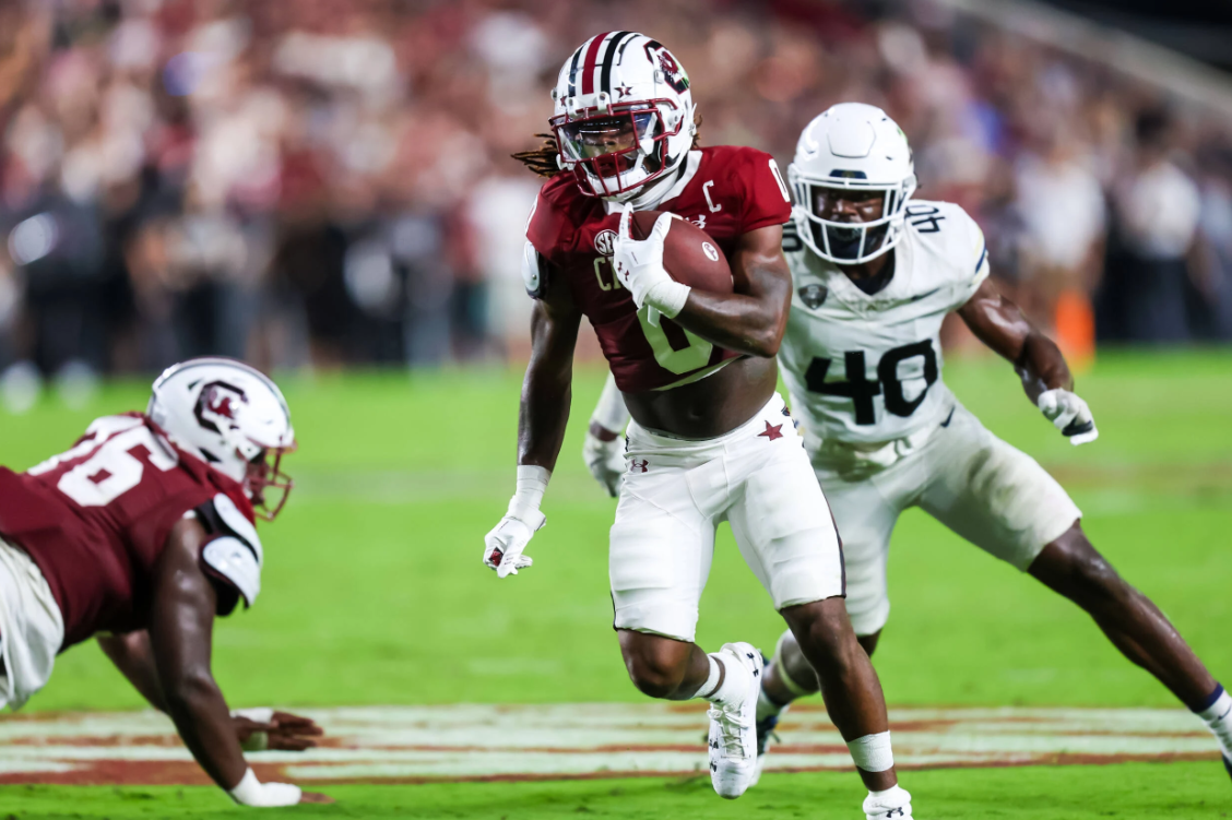 South Carolina running back Juju McDowell (#0) runs with the ball against Akron.