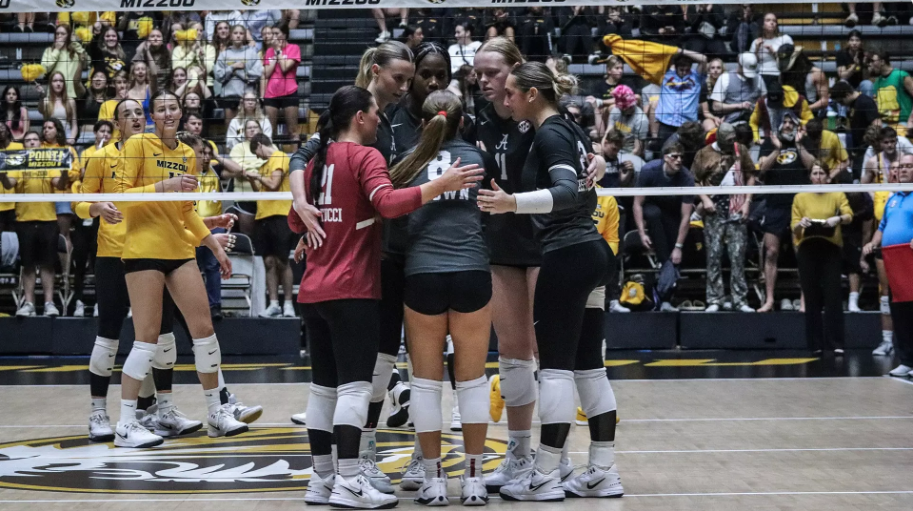 Alabama volleyball players huddle up during their match against Missouri.