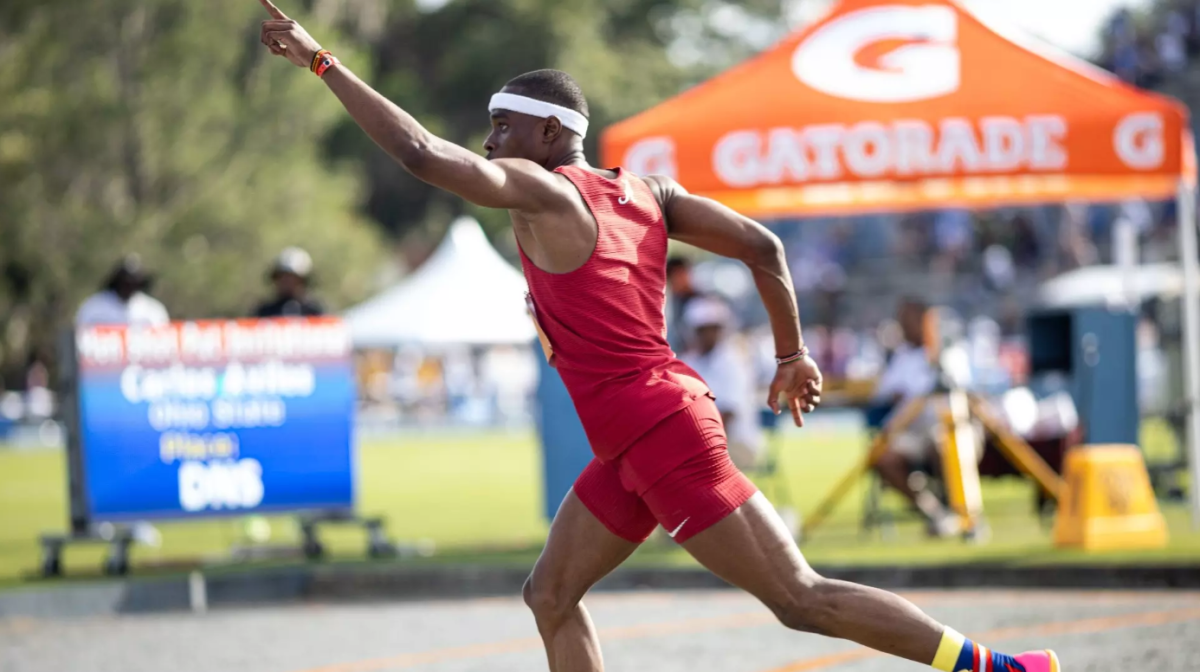 Former Alabama sprinter Tarsis Orogot poses after a race.