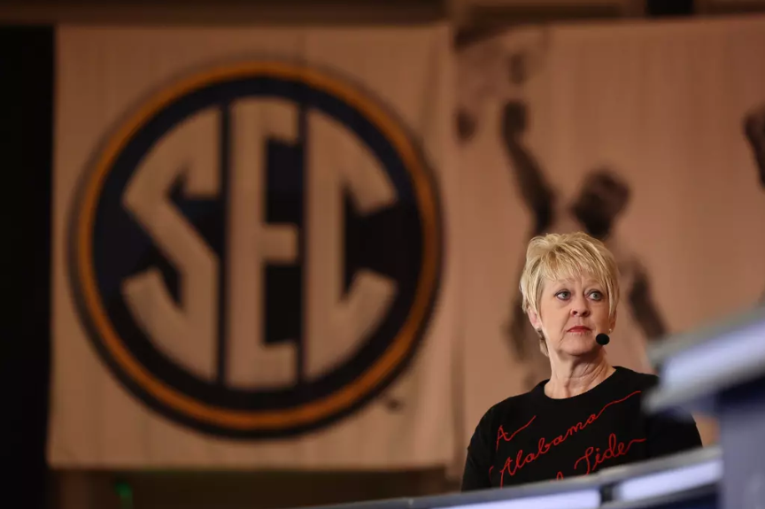 Alabama head coach Kristy Curry being interviewed during SEC Media Day at Grand Bohemian Hotel in Birmingham, AL on Wednesday, Oct 16, 2024.