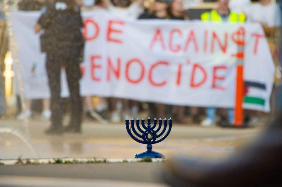 A menorah sits on the side of the counterprotesters at the UA pro-Palestine protest on May 1.