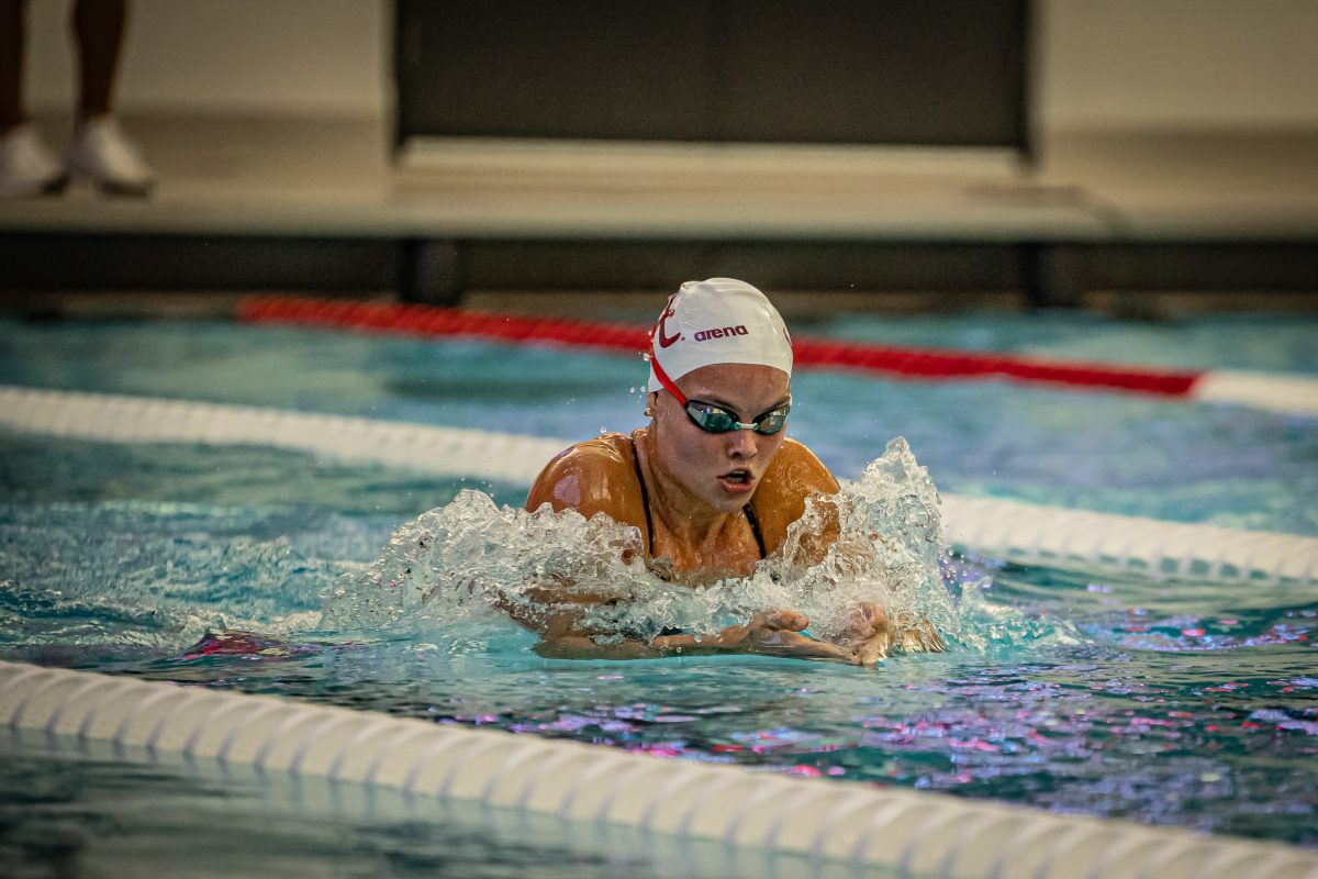 An Alabama swimmer competes against Missouri.