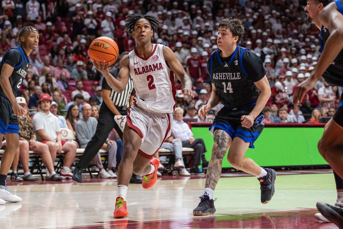 Alabama guard Aden Holloway (#2) prepares to jump for a shot against UNC Asheville.