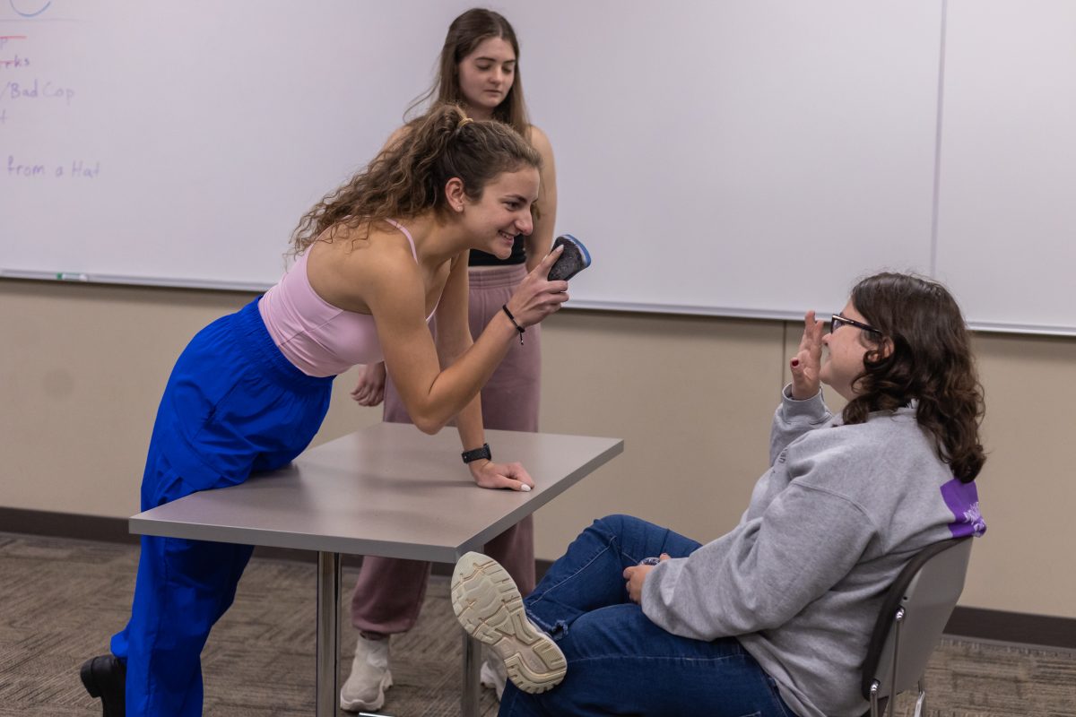 The Crimson Comedy Collective at one of their improv workshops. 