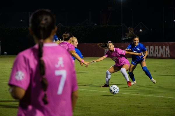 Alabama midfielder/defender Melina Rebimbas (#23) fights for the ball against Kentucky.