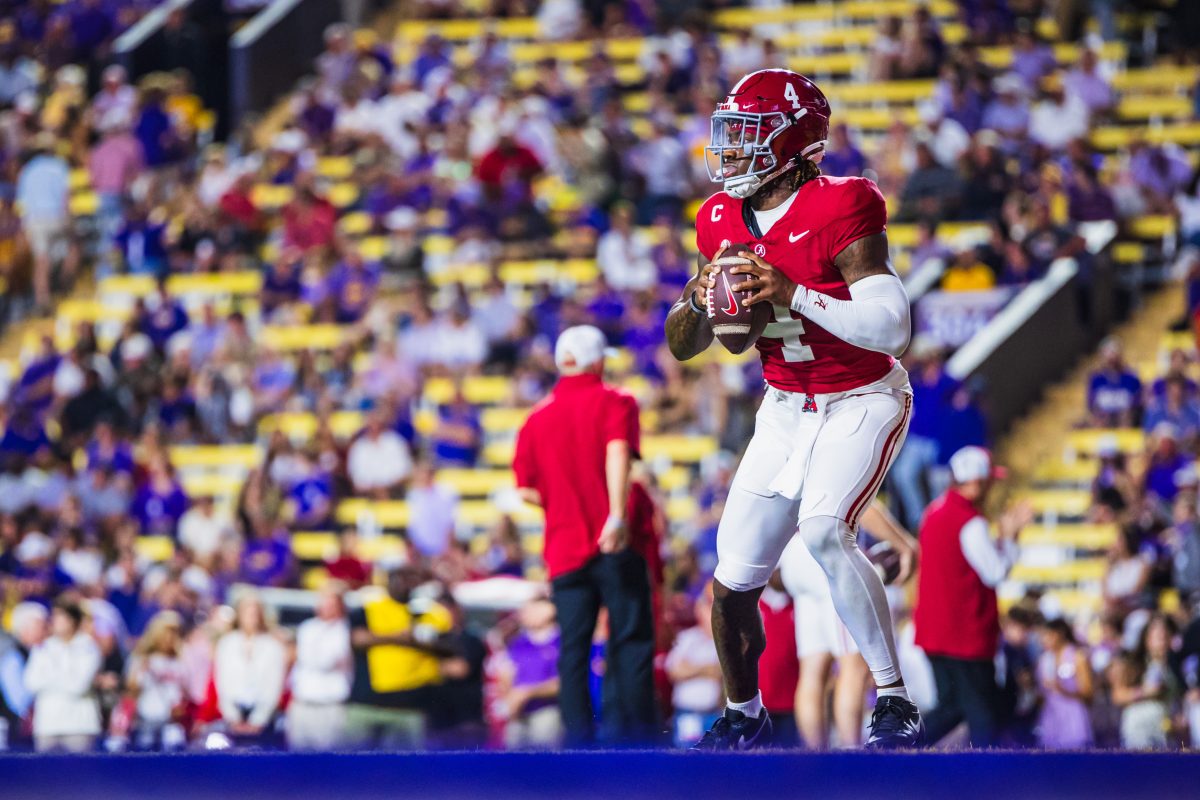 Alabama quarterback Jalen Milroe (#4) warms up before the game against LSU.