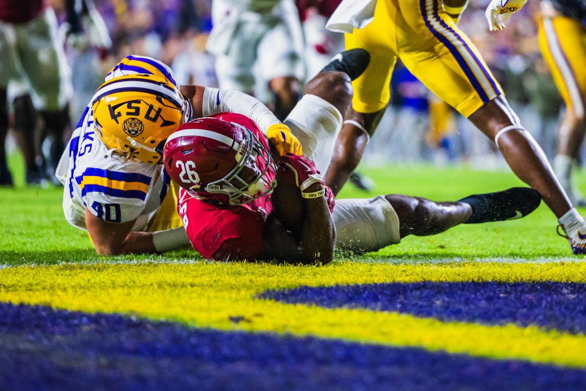 Alabama running back Jam Miller(#26) scores a touchdown. 