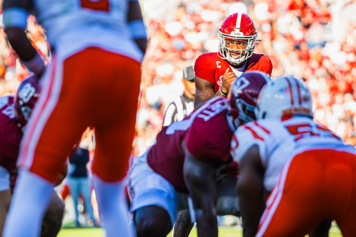 Alabama quarterback Jalen Milroe (#4) looks to snap the ball against Mercer.