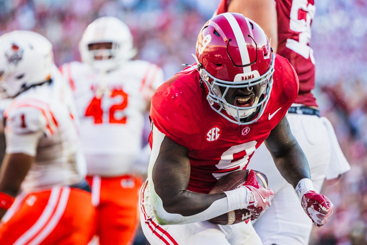 Alabama running back Richard Young (#9)  celebrates after a touchdown. 