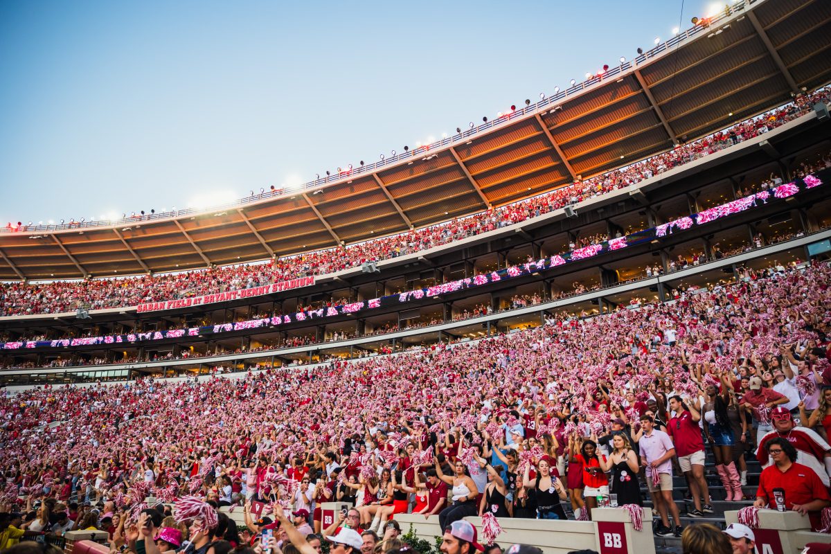 Alabama fans cheer during a football game in Bryant-Denny Stadium.