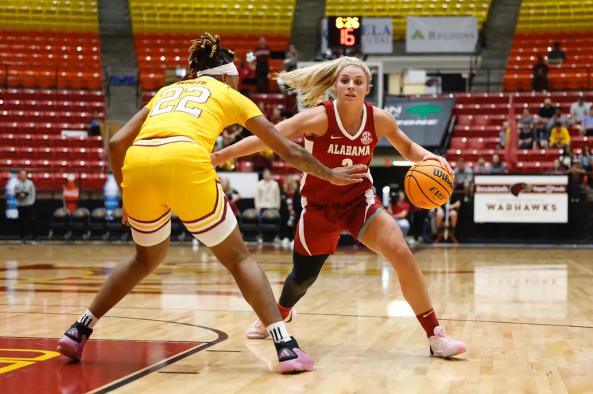 Alabama guard Sarah Ashlee Barker (#3) dribbles down the court against ULM.