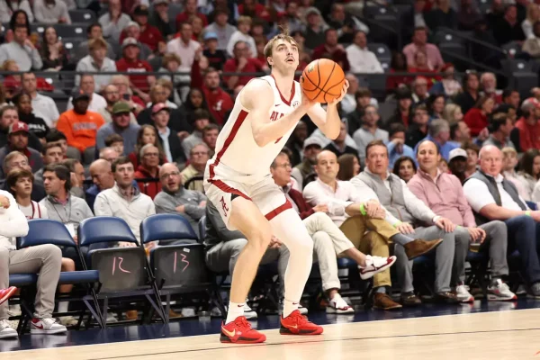 Alabama forward Grant Nelson (#4) looks to shoot a three against Illinois at Legacy Arena at BJCC in Birmingham, AL on Wednesday, Nov 20, 2024.