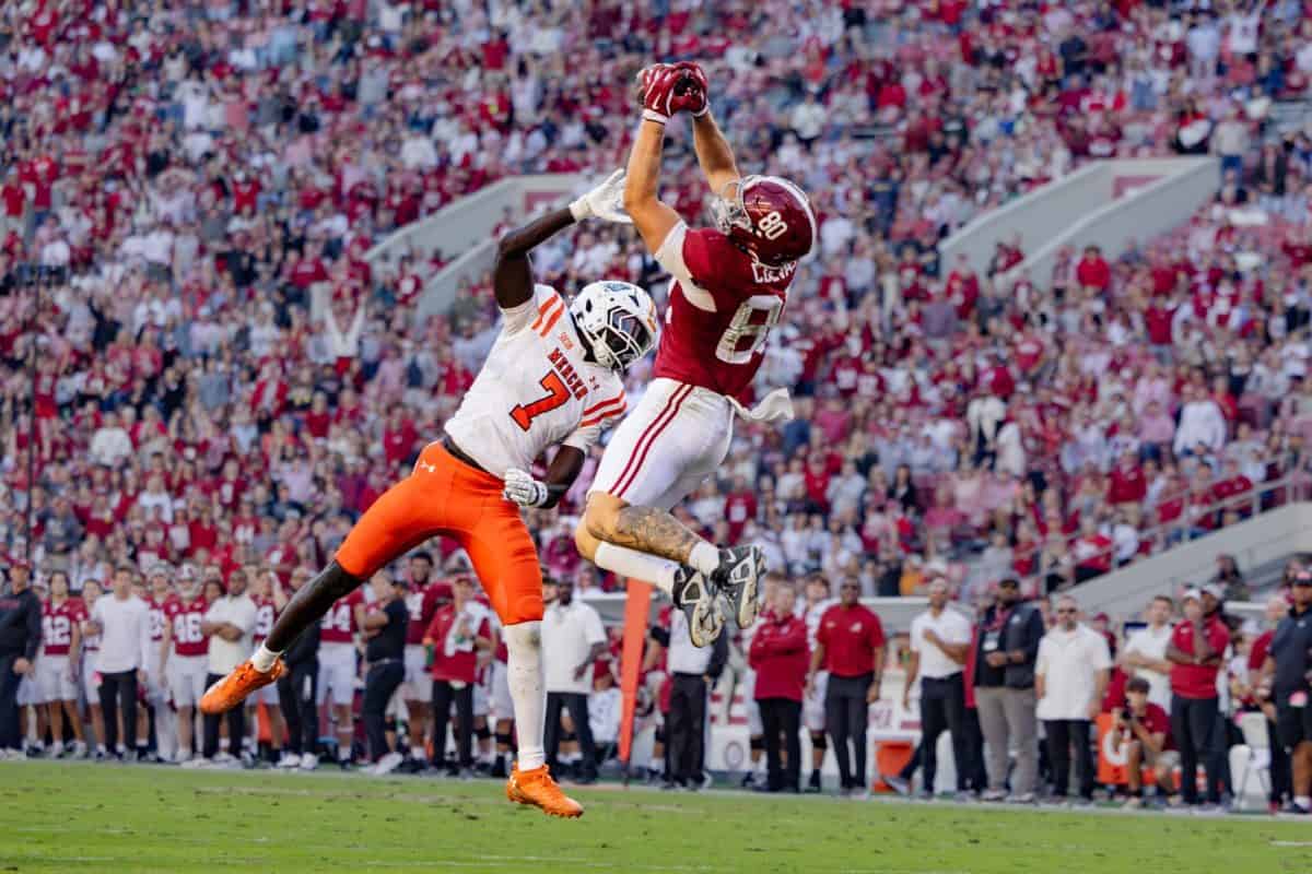 Alabama tight end Josh Cuevas (#80) jumps to make a catch against Mercer.