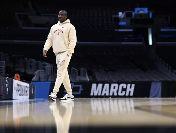 Alabama basketball assistant coach Preston Murphy walks down the court.