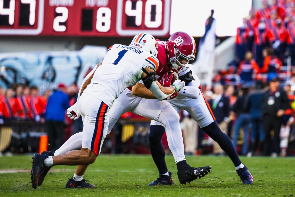 Tight end CJ Dippre gets tackled in Alabama's game against Auburn on Nov. 30. 