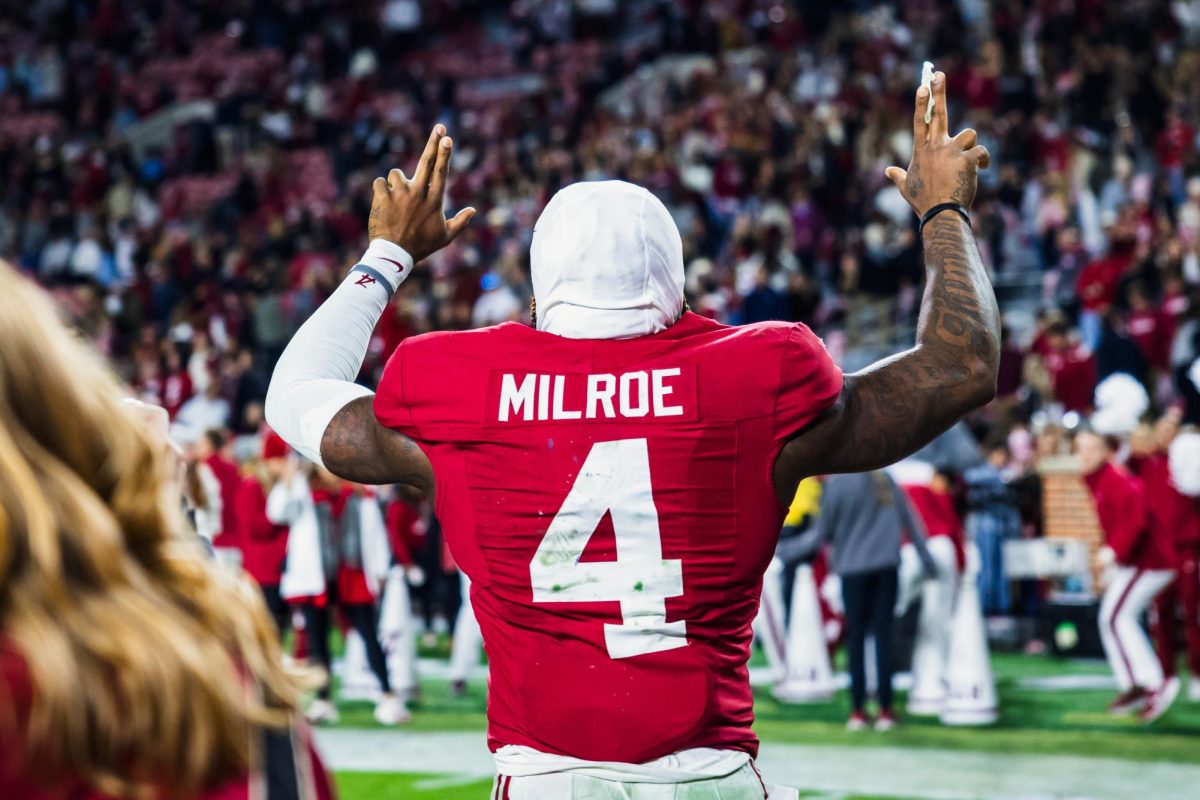 Alabama quarterback Jalen Milroe (#4) celebrates after beating Auburn on Nov. 30.