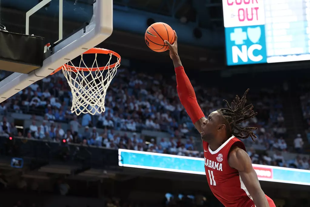 Alabama center Clifford Omoruyi (#11) dunks the ball against UNC at Dean E. Smith Center in Chapel Hill, NC on Wednesday, Dec 4, 2024.