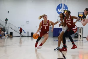 Alabama Guard Sarah Ashlee Barker (#3) drives to the basket against Michigan State University at Rubin Arena in West Palm Beach, FL during the West Palm Beach Classic on Friday, Dec 20, 2024.