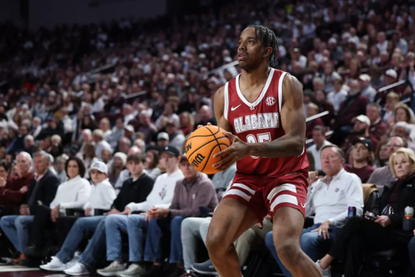 Alabama forward Derrion Reid (#35) looks to make a three against Texas A&M.