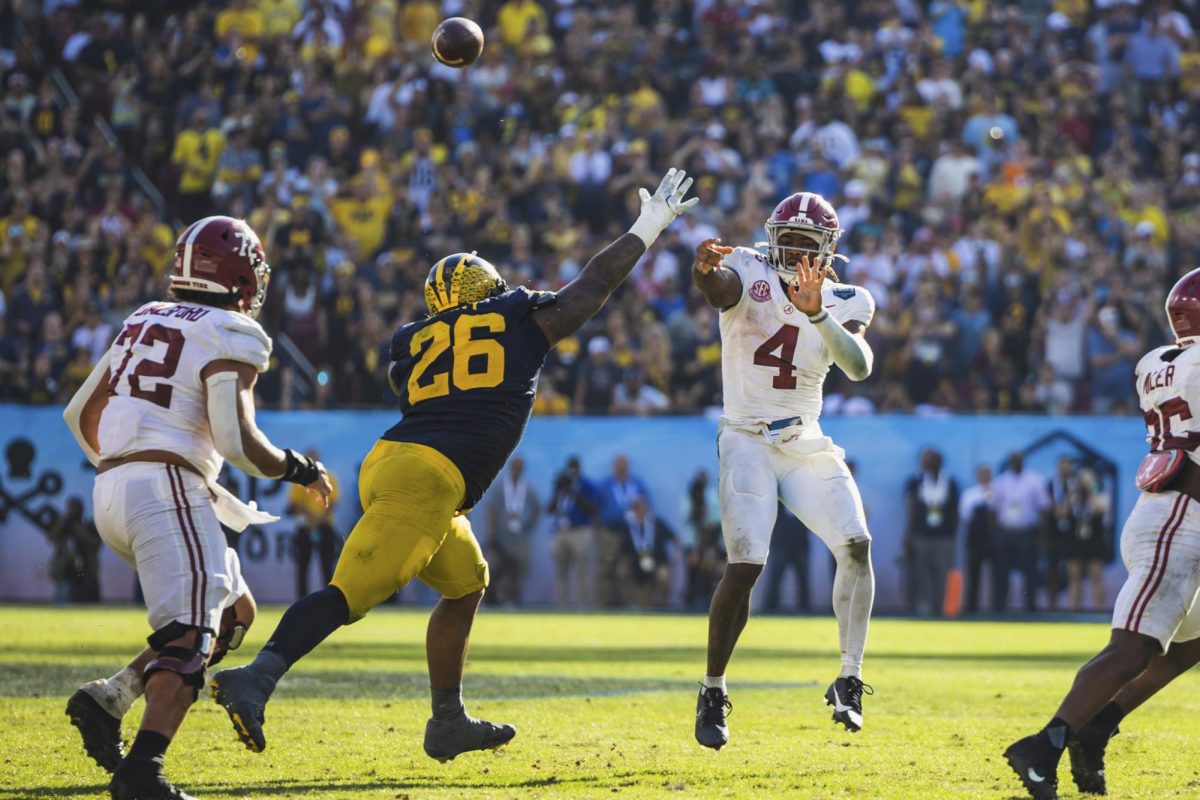 CW// Riley Thompson, Quarterback Jalen Milroe attempts a pass versus Michigan in the 2024 Reliaquest Bowl.