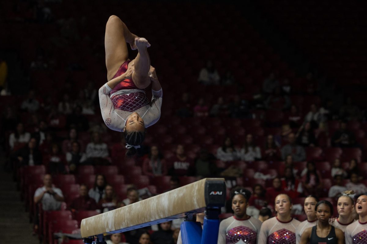 Alabama Gymnast performs a beam routine against North Carolina.