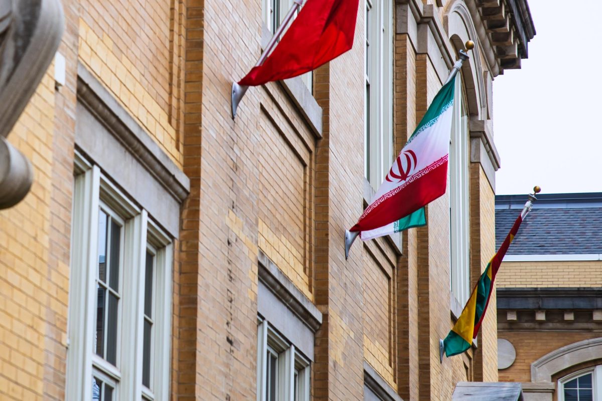 The Iranian flag flies in front of B.B. Comer Hall.