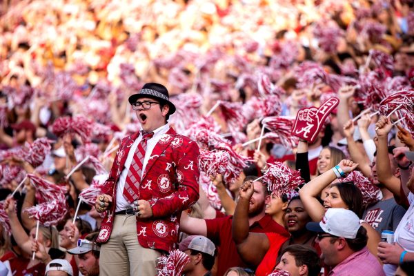 Students cheer during a football game in Saban Field at Bryant-Denny Stadium.