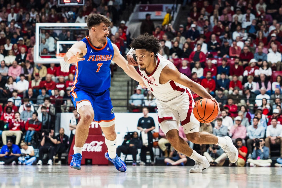 Alabama guard Mark Sears (#1) dribbles down the court against Florida at Coleman Coliseum in Tuscaloosa, AL on March 5, 2025.