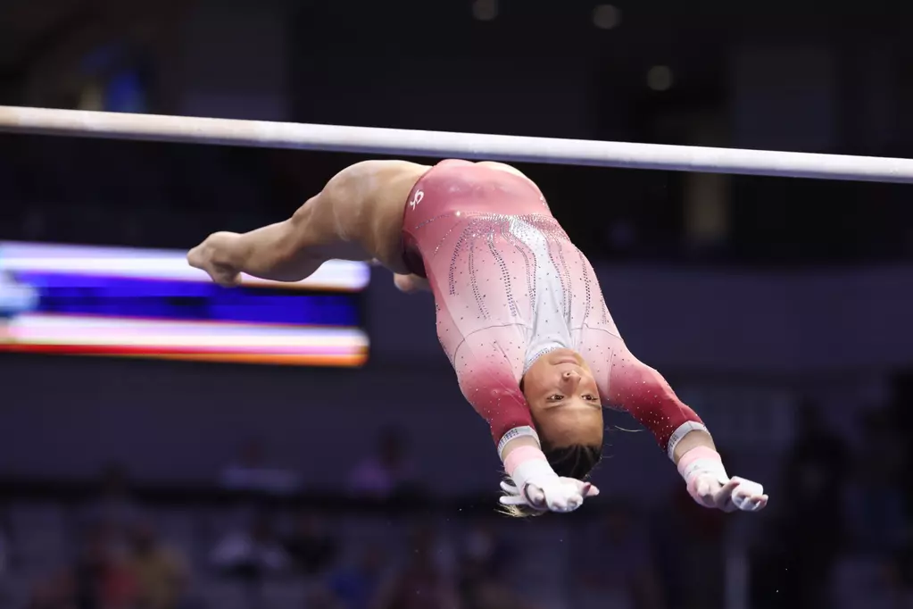 Alabama Gymnast Lilly Hudson competes on the bars during the NCAA Championships Semifinals at Dickies Arena in Fort Worth, TX on Thursday, Apr 17, 2025.