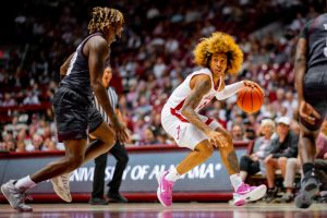 Former Alabama guard JD Davison (#3) in action against Texas A&M at Coleman Coliseum in Tuscaloosa, AL on March 2, 2022.