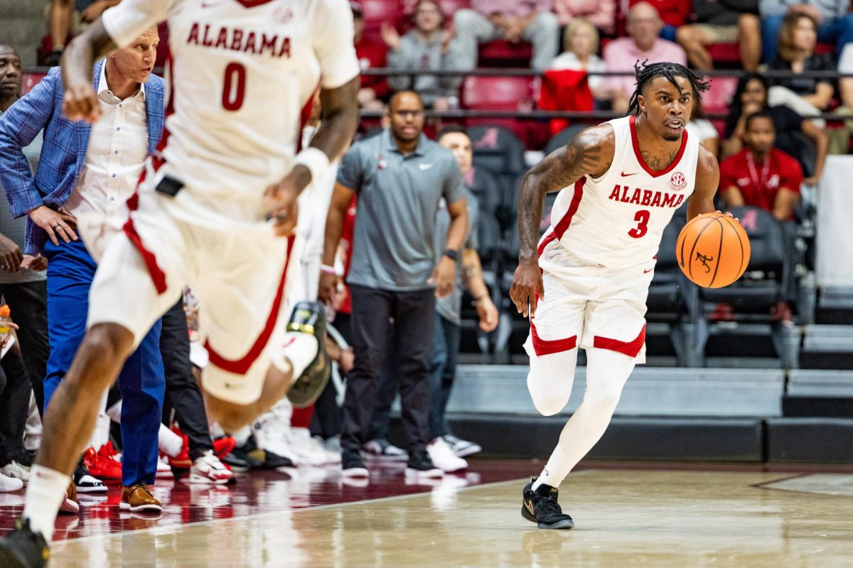 Alabama basketball guard Latrell Wrightsell Jr. (#3) moves the ball down the court during the game versus Arkansas State on November 8, 2024.