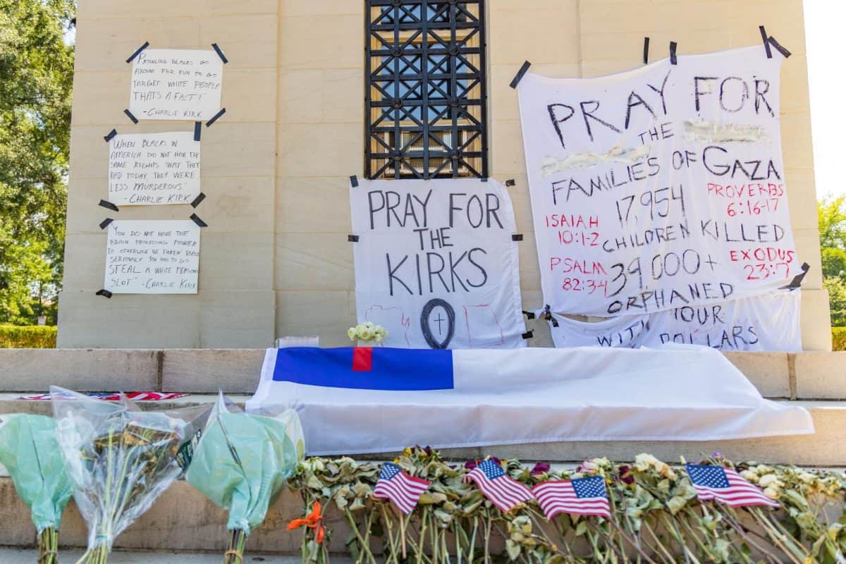 Signs were attached to Denny Chimes following Charlie Kirk's assassination, one in support of Kirk, some bearing controversial quotes from the conservative activist, and others citing numbers of children killed in Gaza. The University removed all signage on Tuesday. 