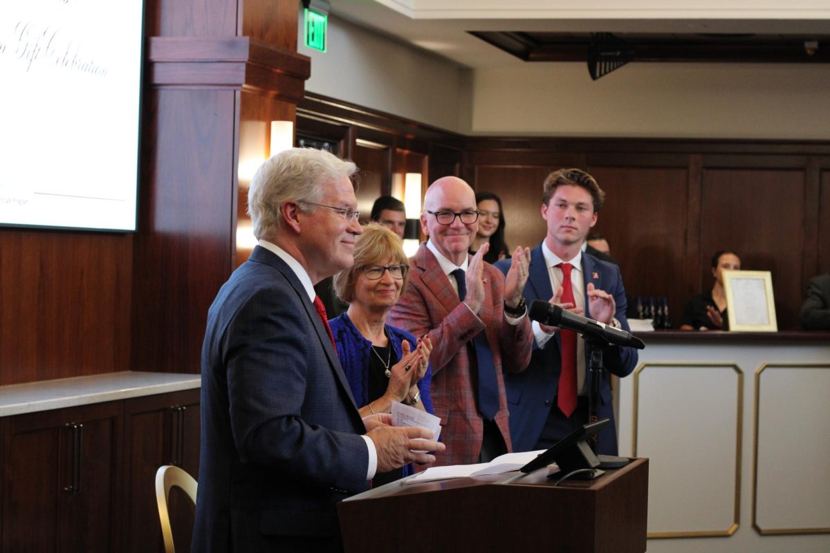 Rance Sanders, left, was applauded for his wife's and his $5 million gift to the now Rance M. Sanders Real Estate Program.