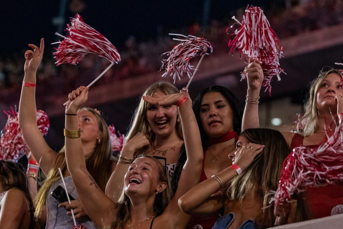 Students cheer on the Crimson Tide against the ULM Warhawks